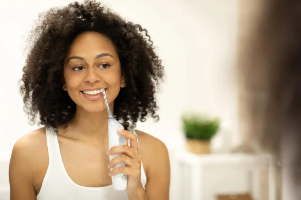 Can I Use a Water Flosser in My Dental Crowns in Concord