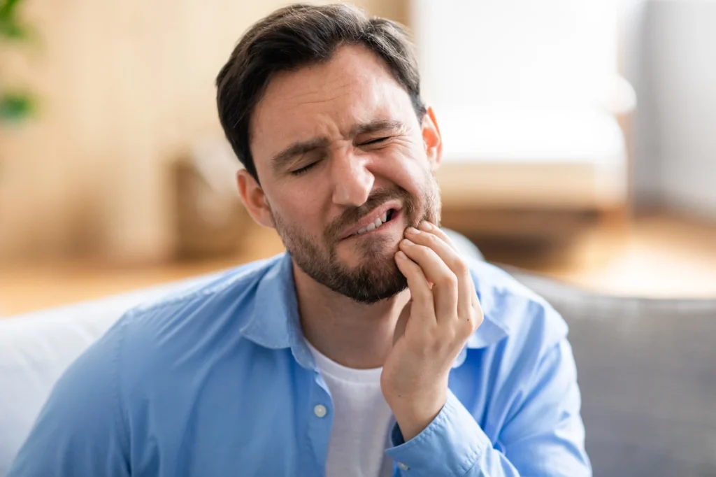 patient experiencing dental pain in Concord