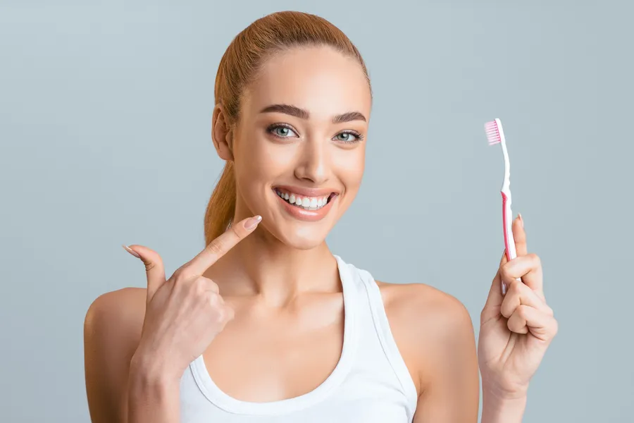 happy woman following Concord CA dental care